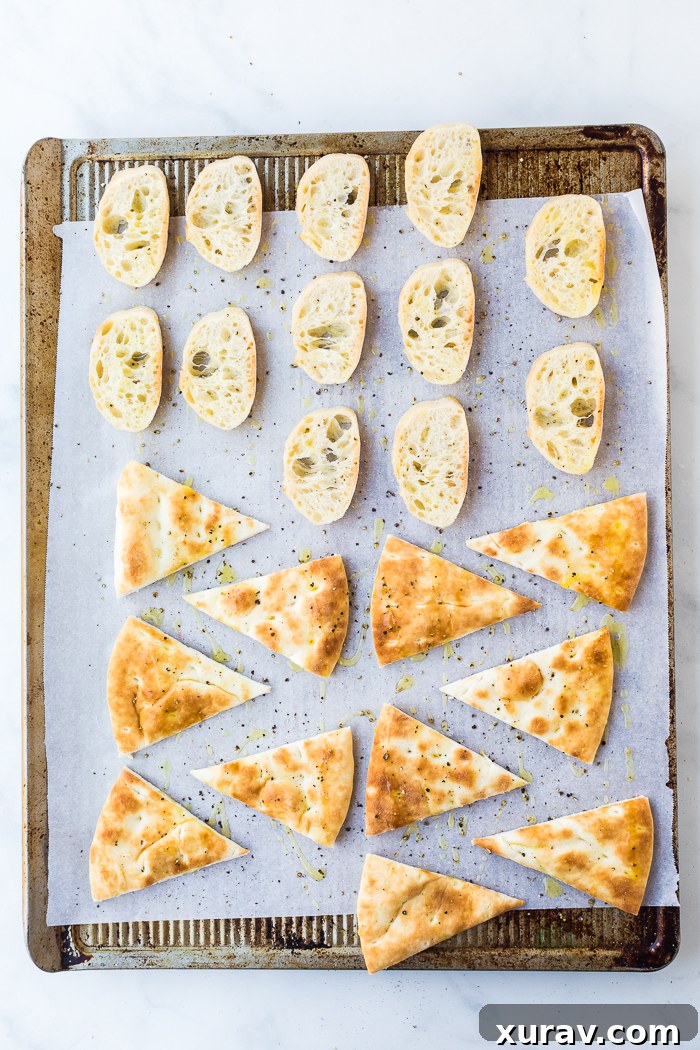 A stunning overhead shot of a Friendsgiving feast, featuring the hummus appetizer flight prominently alongside other delicious dishes, surrounded by festive decor.