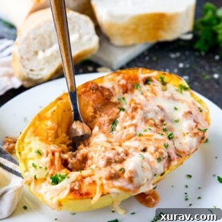 Spaghetti Squash stuffed with Lasagna fillings, a truly delicious and healthy meal option.