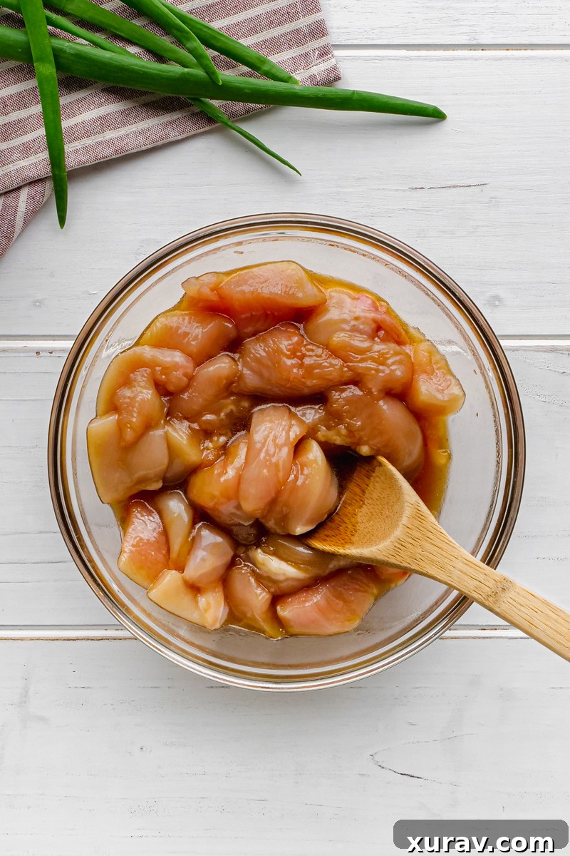 A bowl of freshly made Kung Pao Chicken, ready to be enjoyed.