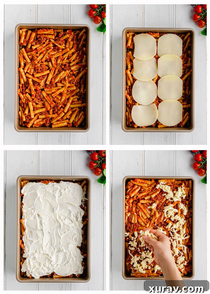 A portion of Baked Ziti being served from a large baking dish, highlighting the steam and inviting texture.