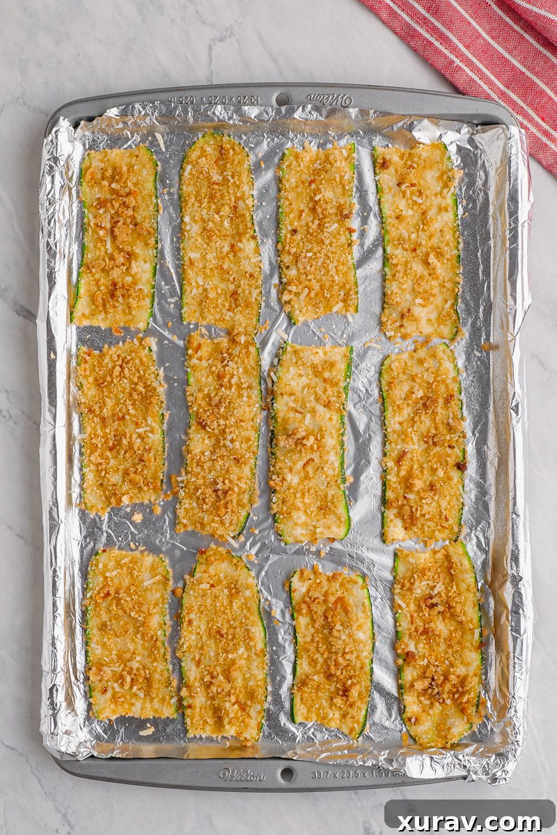 Zucchini strips and coating ingredients laid out
