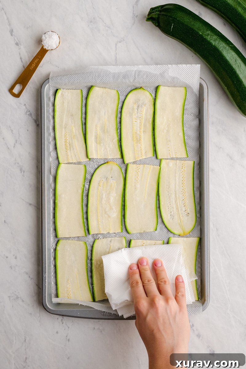 Thinly sliced zucchini strips prepared for lasagna