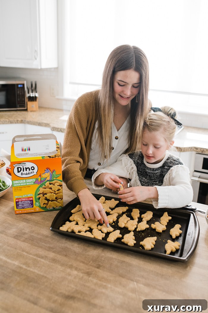 A close-up of cooked Yummy Dino Buddies chicken nuggets.