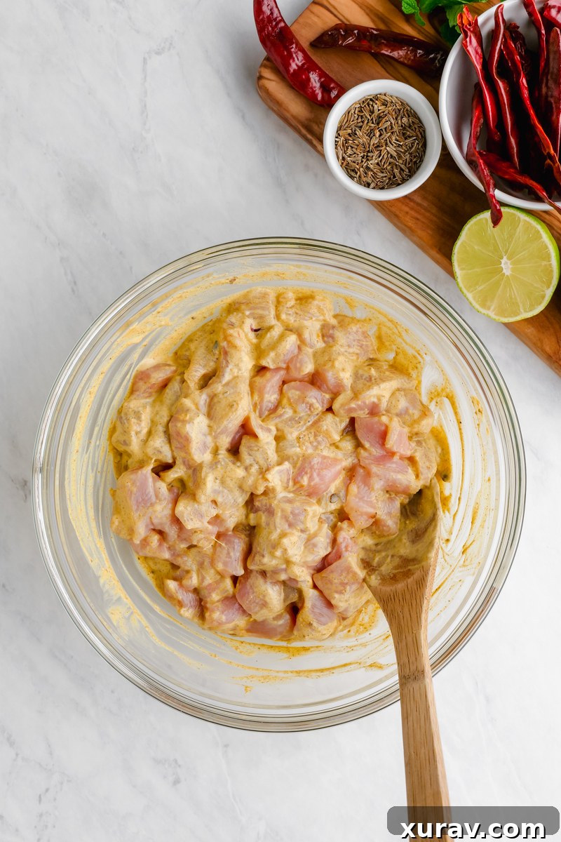 Ingredients for Keto Chicken Biryani laid out on a cutting board.
