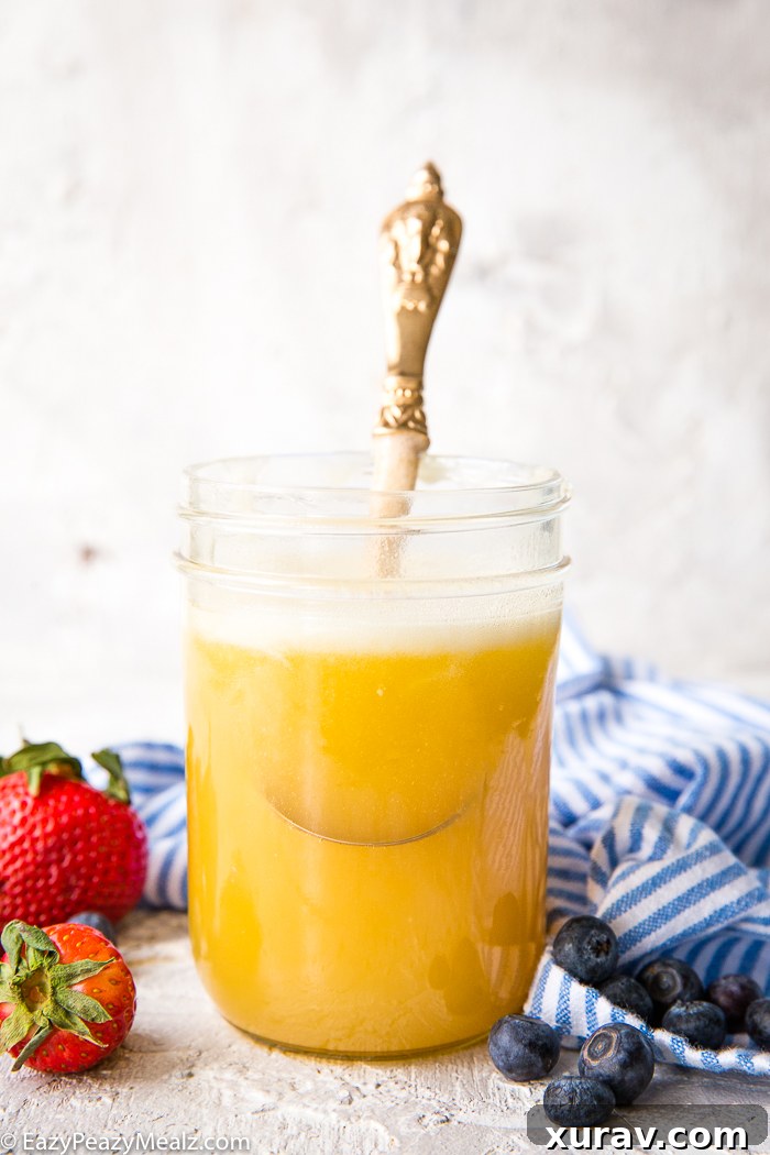 Buttermilk syrup in a jar with pancakes