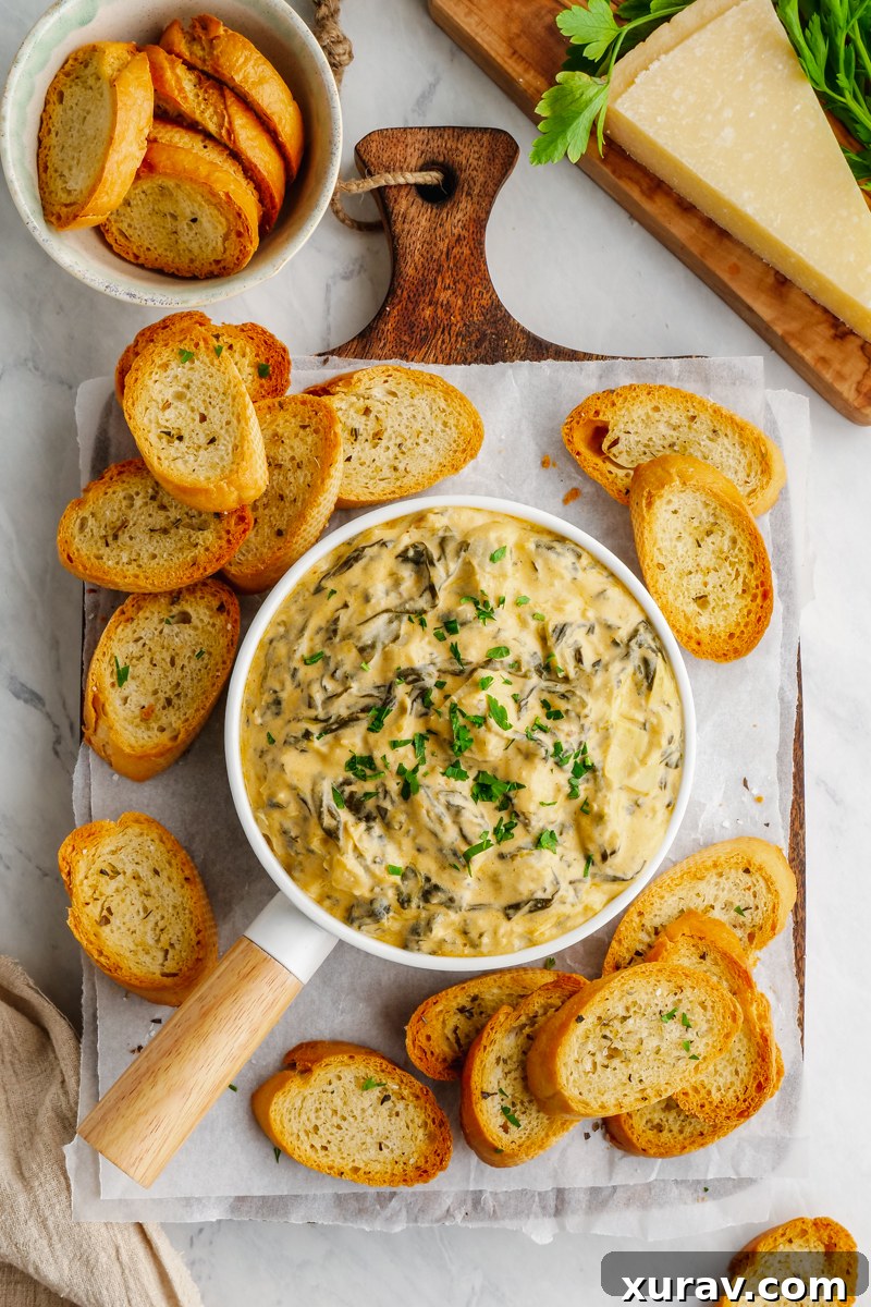 Instant Pot Spinach Dip, a cheesy dip loaded with flavor, and so easy to make. Only takes 5 minutes cook time. 