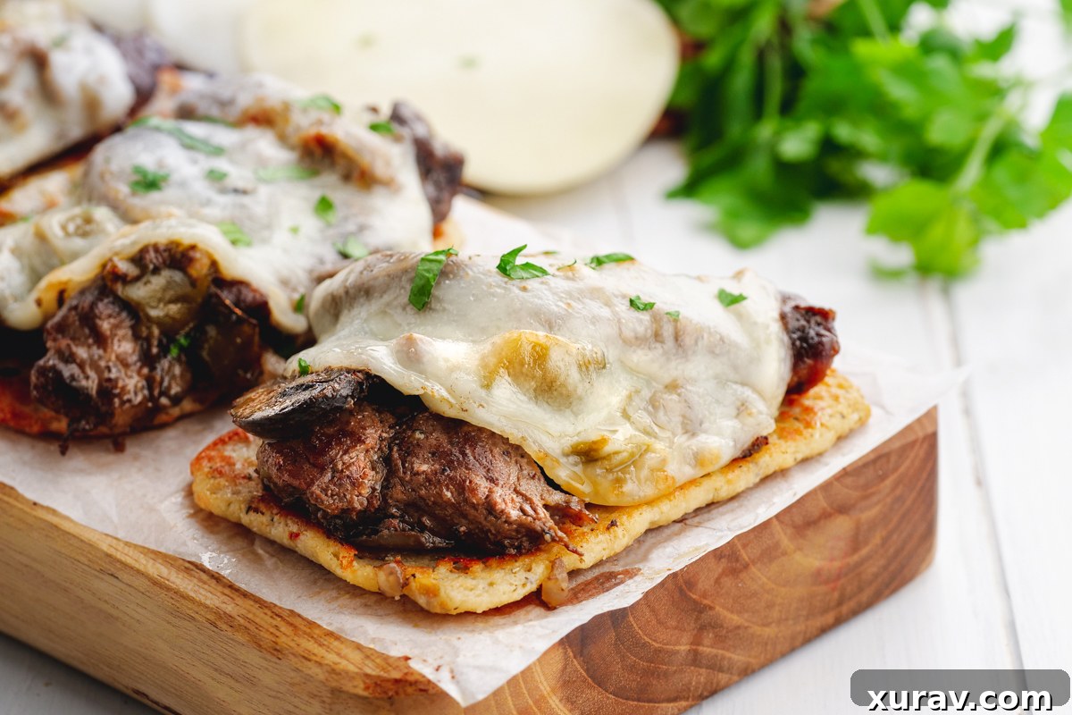 Selection of delicious keto-friendly side dishes, including soup, asparagus, and guacamole, perfect with Philly Cheesesteak.