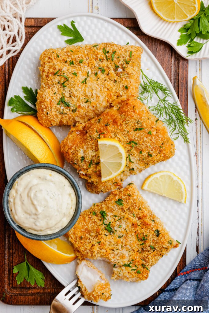 Oven fried fish on a platter, golden brown and perfectly cooked