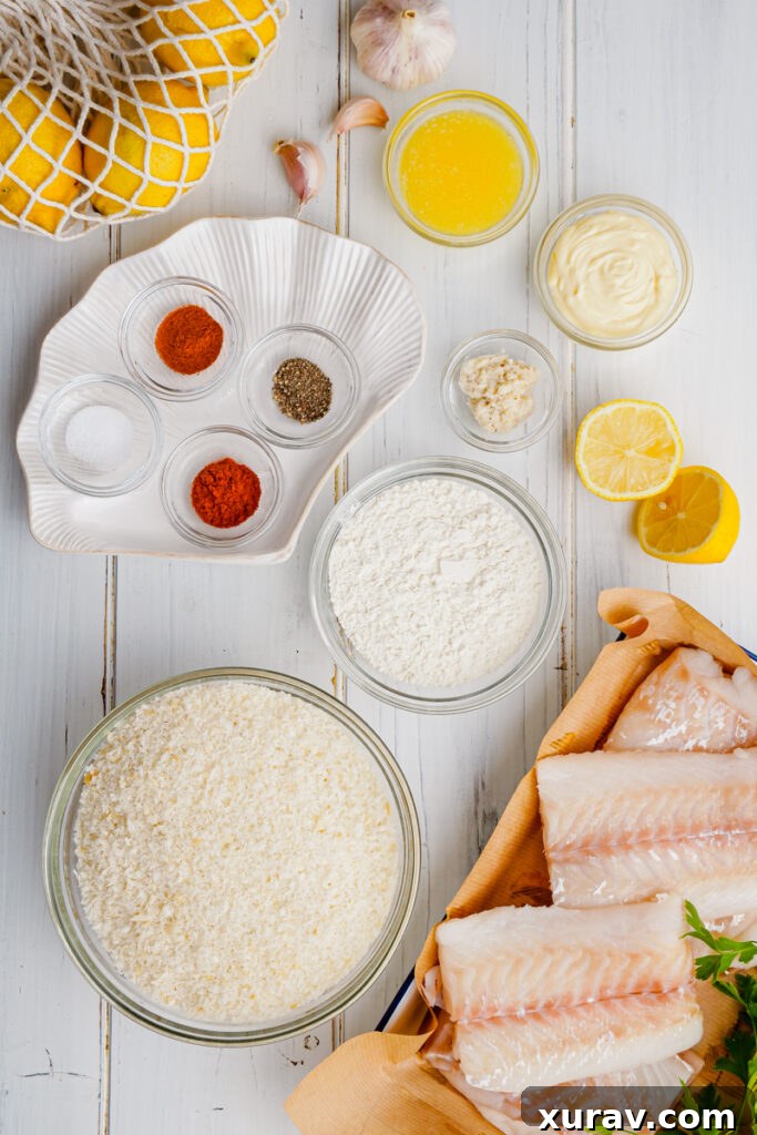 Everything you need to make oven fried fish, ingredients laid out