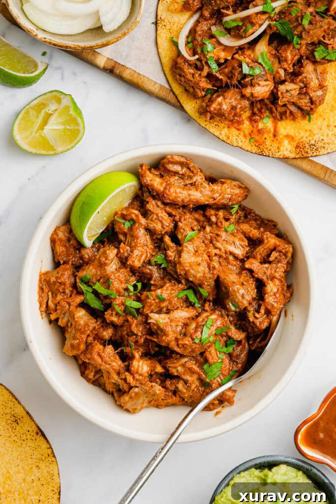 A bowl of shredded pork mole tacos ready for serving.
