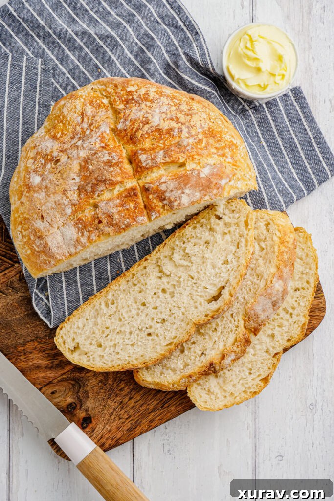beer bread being cut op cutting board
