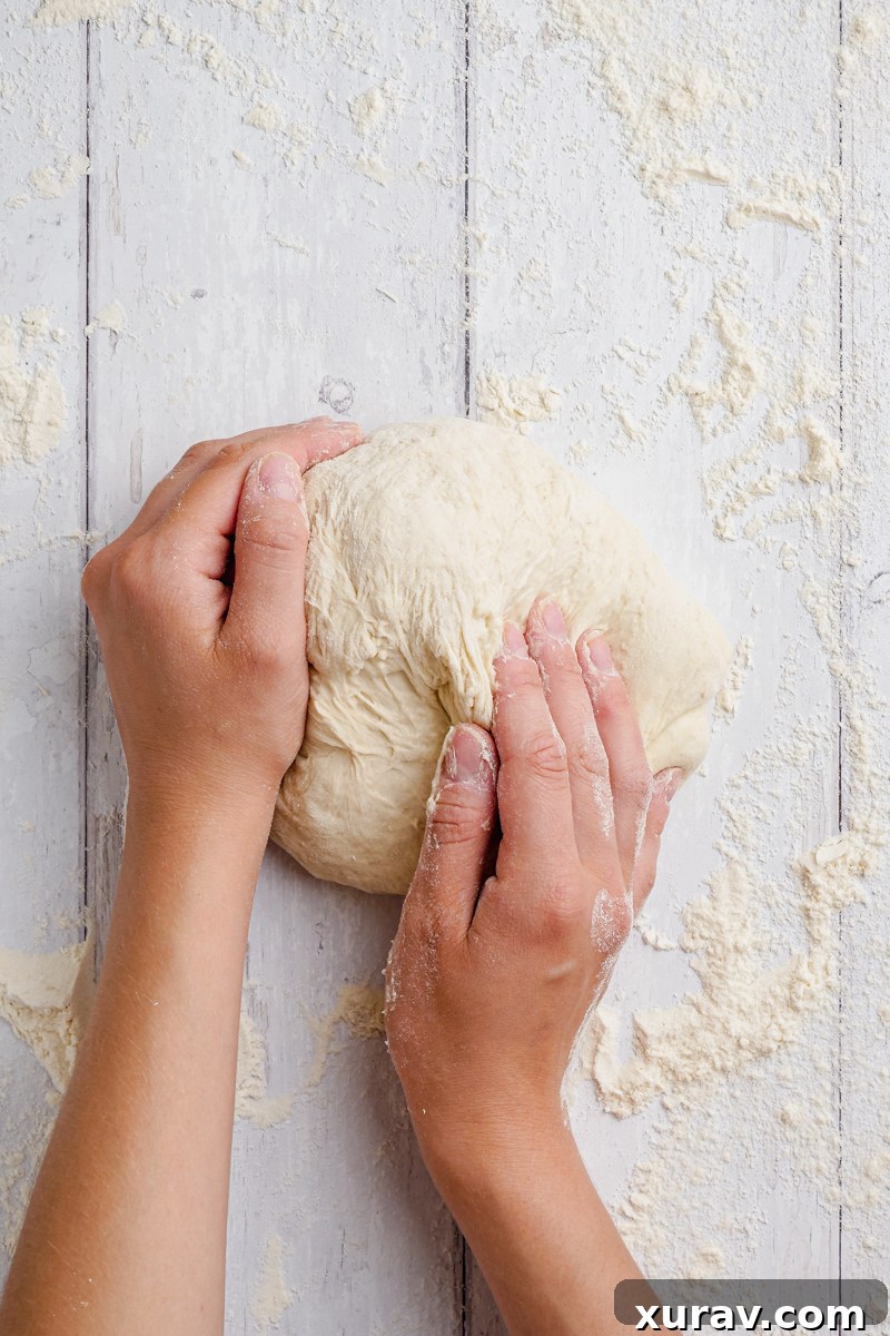 hands kneading the bread