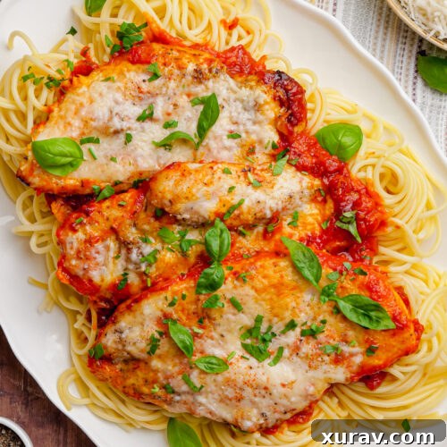 Slow Cooker Chicken Pomodoro elegantly presented on a white platter