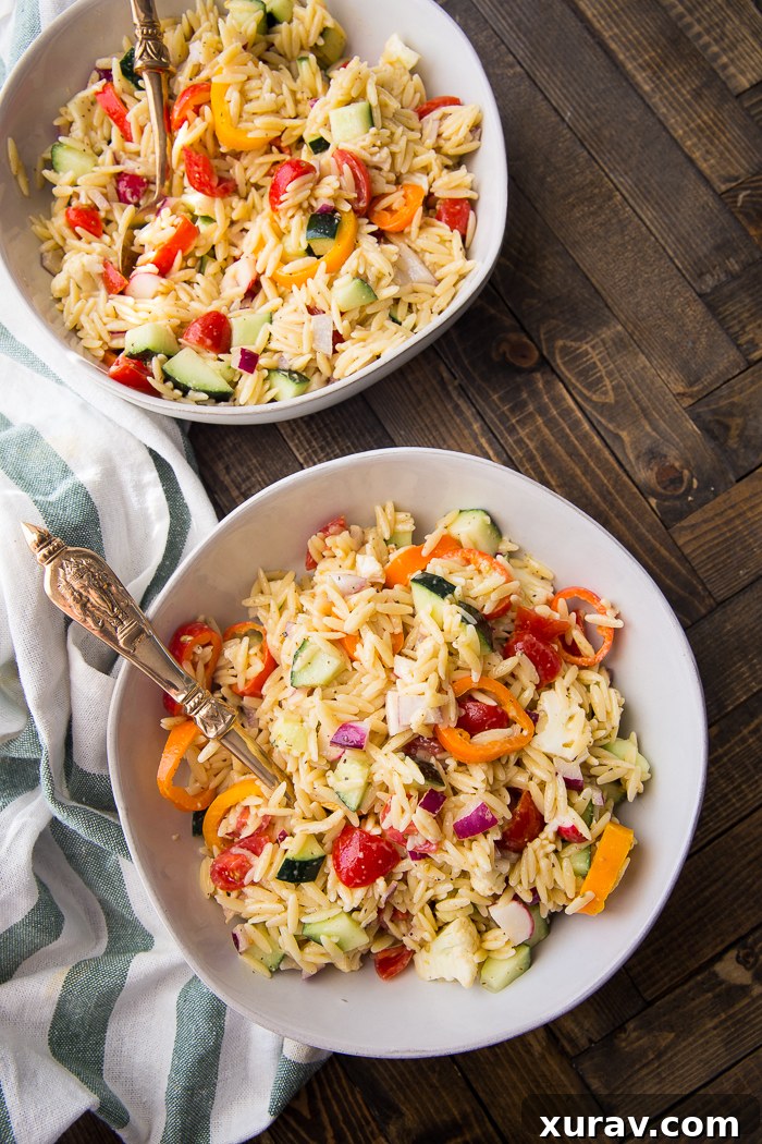 Orzo Pasta Salad with Lemon Vinaigrette in a serving bowl, showcasing the colorful vegetables and pasta.