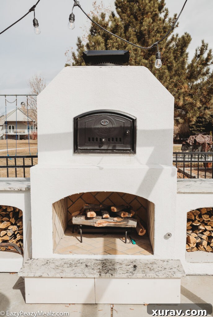 Round grove brick oven and fireplace combo