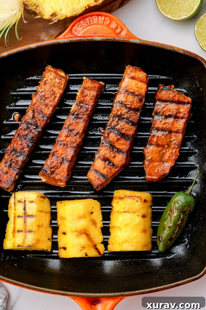 Grilling fish, pineapple, and jalapenos for fish tacos