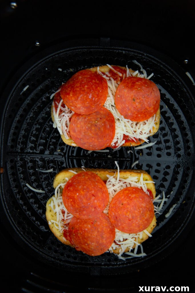Building your Texas toast pizzas in the air fryer