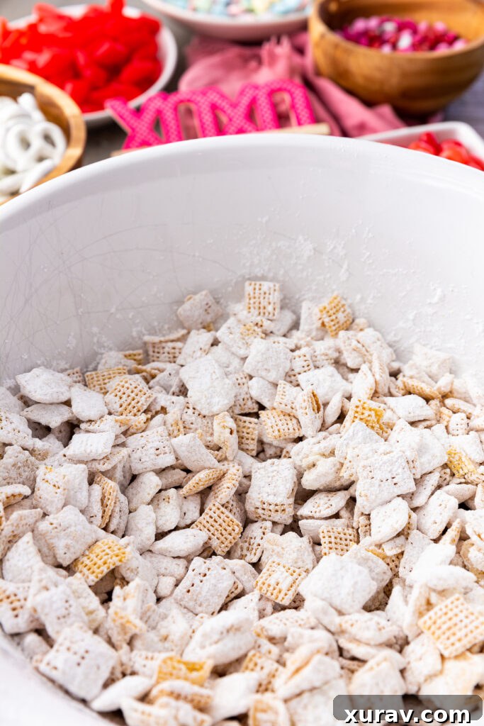 The chex cereal base for the BEST Valentine Snack Mix, made with Chex cereal and featuring sweet and salty, crunchy and chewy. It has it all and is SO EASY to make!
