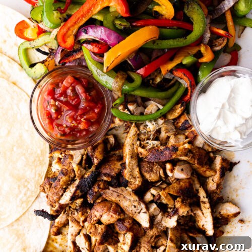 Easy Chicken Fajitas- A super simple recipe for classic chicken fajitas cooked stove top or on the grill or griddle.