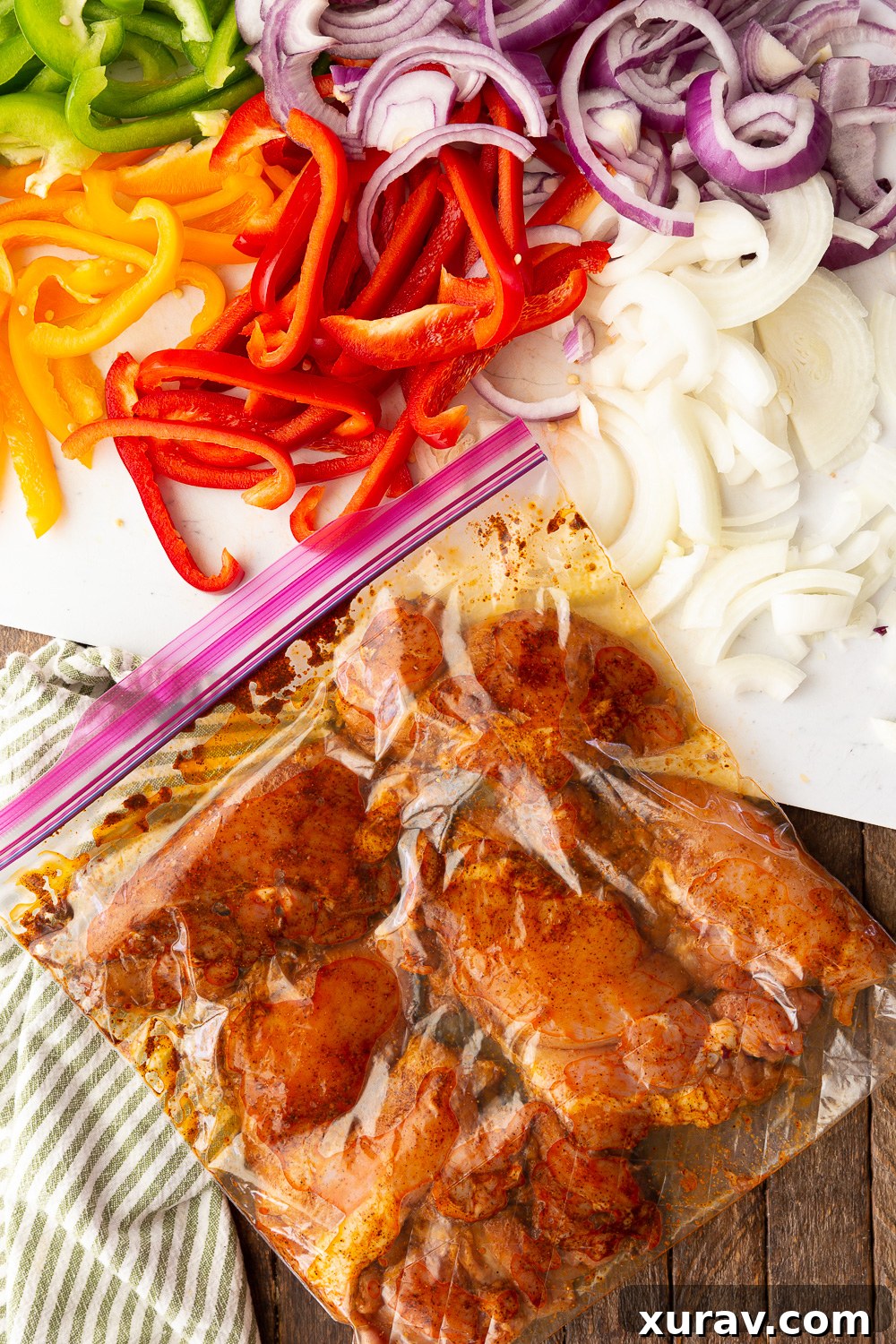 Easy to make chicken fajitas spice rub applied to chicken strips, ready for cooking.