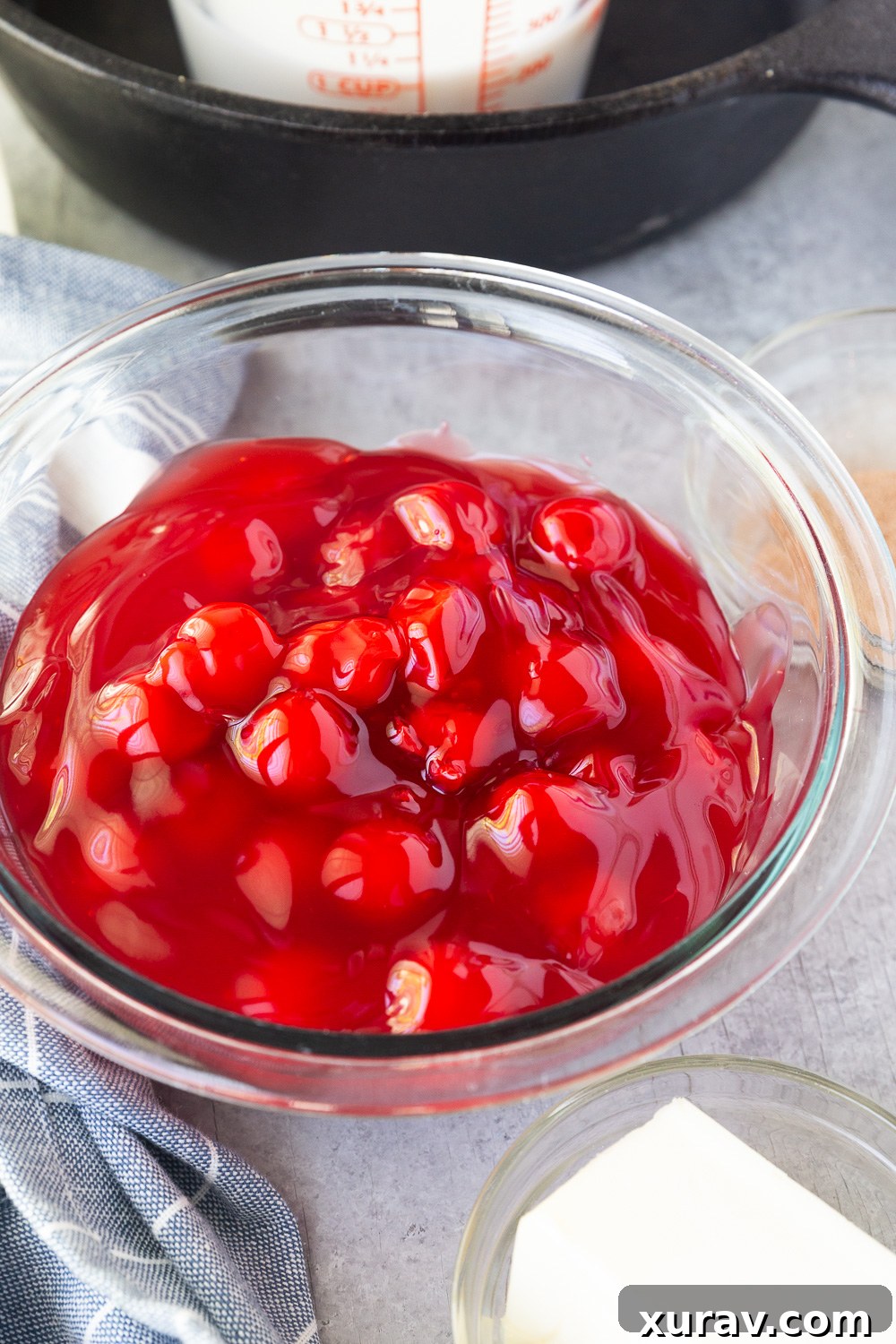 Montmorency tart cherries, or cherry pie filling for cherry cobbler, showcasing the vibrant red color.