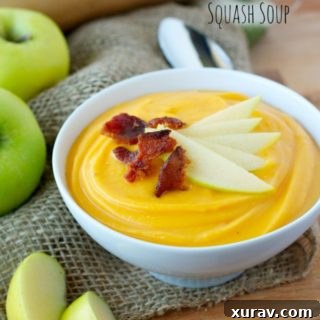 Delicious Apple Butternut Squash Soup in a Bowl with Garnishes