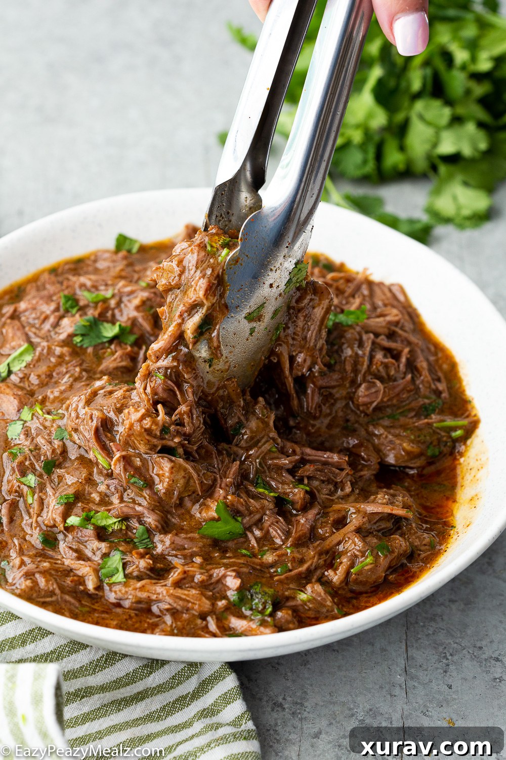 Instant pot shredded beef, a flavorful shredded beef that is easy to use in tacos, burritos, and more. 