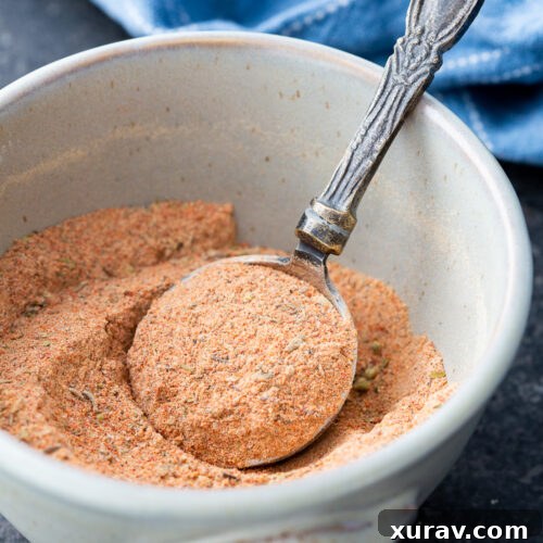 Homemade cajun seasoning blend in a small bowl, ready for use.