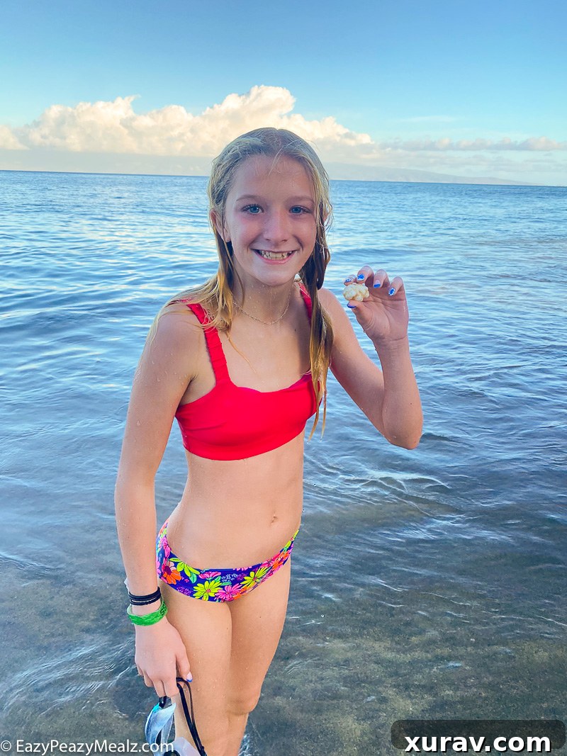 Beach day in Maui Hawaii - Family playing on sandy beach