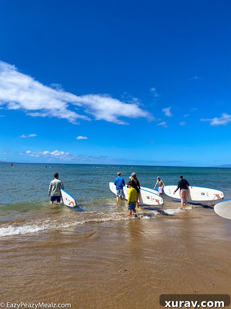Surf lessons in Kama'ole Park Kihei Maui - Kids on surfboards
