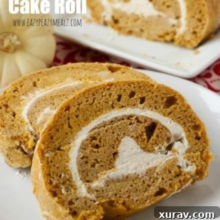 A top-down view of the Gluten-Free Pumpkin Cake Roll with cream cheese filling