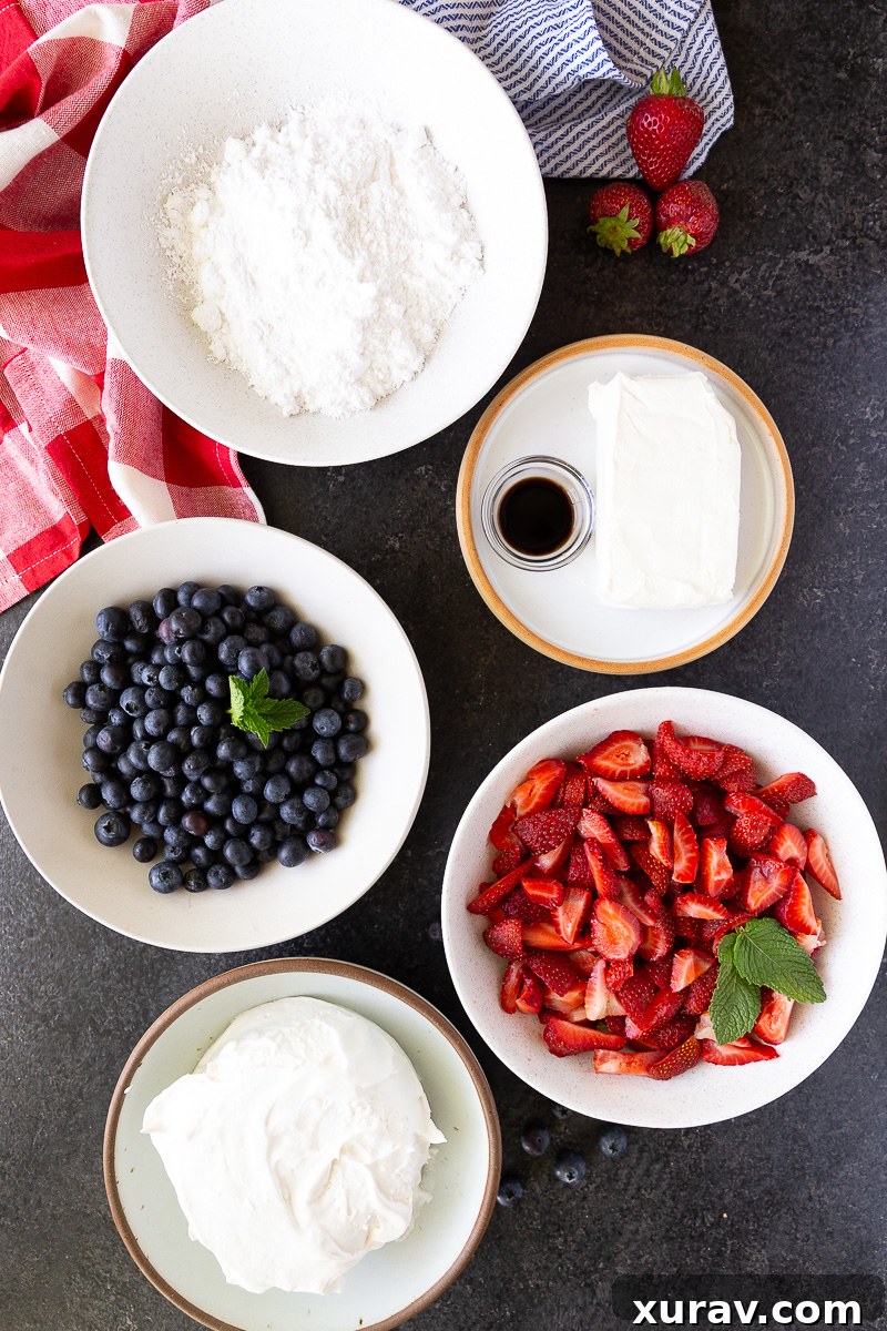 Ingredients needed to make Berry Cheesecake Salad bursting with fresh strawberries, blueberries