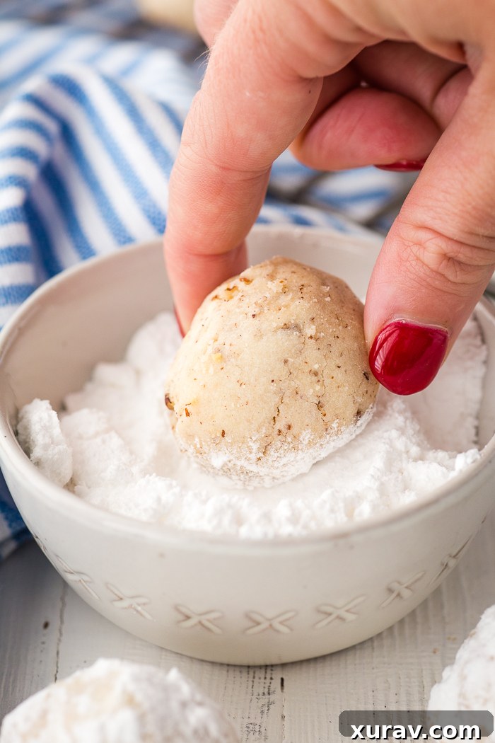 Snowball Cookies cooling on a rack