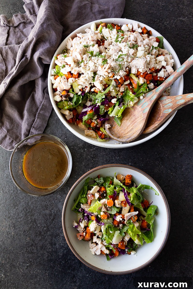 A hearty, flavor-packed salad with tender rotisserie chicken, roasted sweet potatoes, fresh greens, creamy feta, and a simple balsamic dressing. Perfect for an easy, nutritious meal.