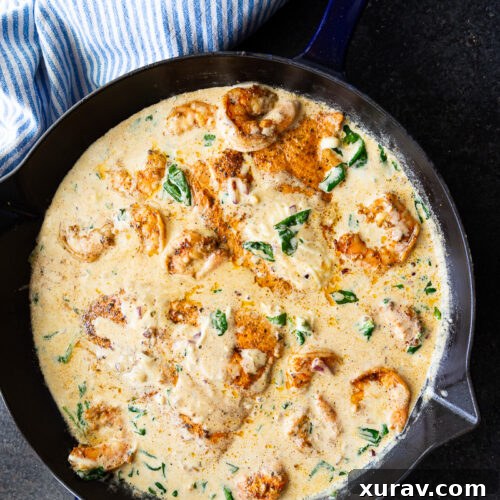 This Cajun salmon and shrimp recipe is packed with bold flavor and served in a creamy spinach cheese sauce. Easy to make, comforting, and perfect for a quick dinner!