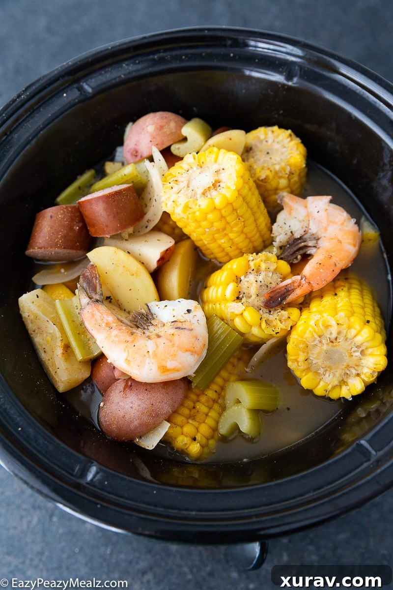 Slow cooker low country boil cooking process