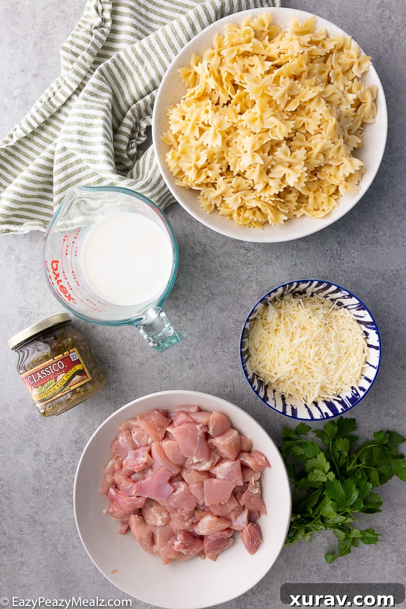 Ingredients needed to make pesto chicken pasta bake