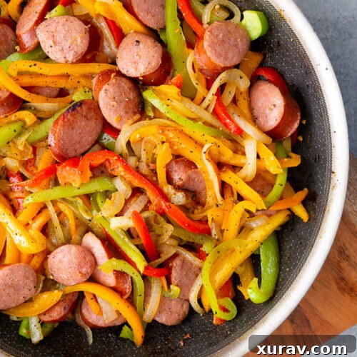 A skillet full of sausage and peppers