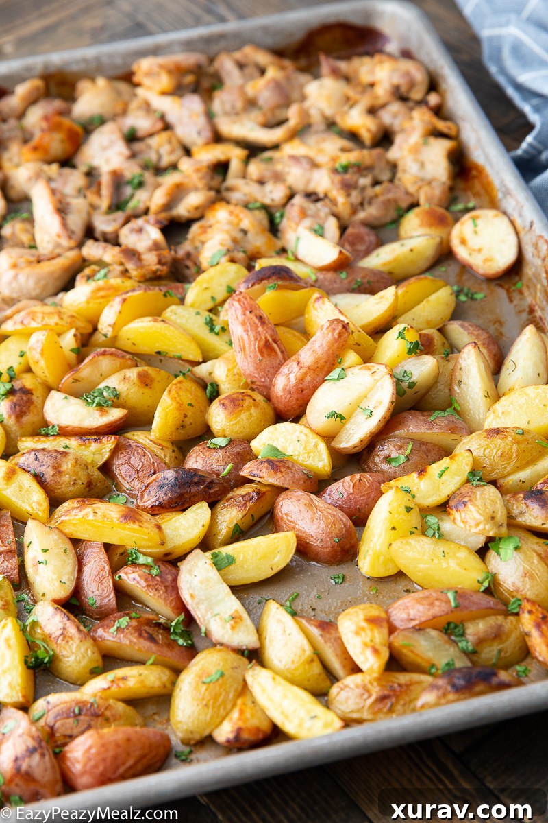 A sheet pan of ranch chicken and potatoes ready to serve