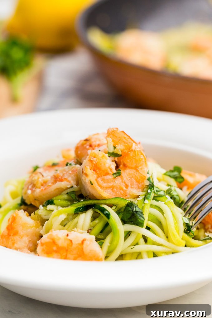 Delicious Zucchini Noodle Shrimp Scampi served in a bowl, showcasing fresh zoodles and juicy shrimp