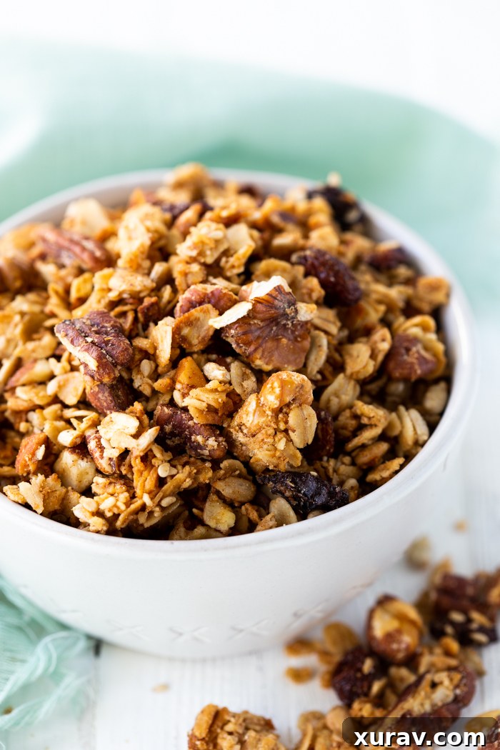 A bowl of homemade granola, showcasing its crunchy texture and healthy ingredients, ready to be enjoyed.