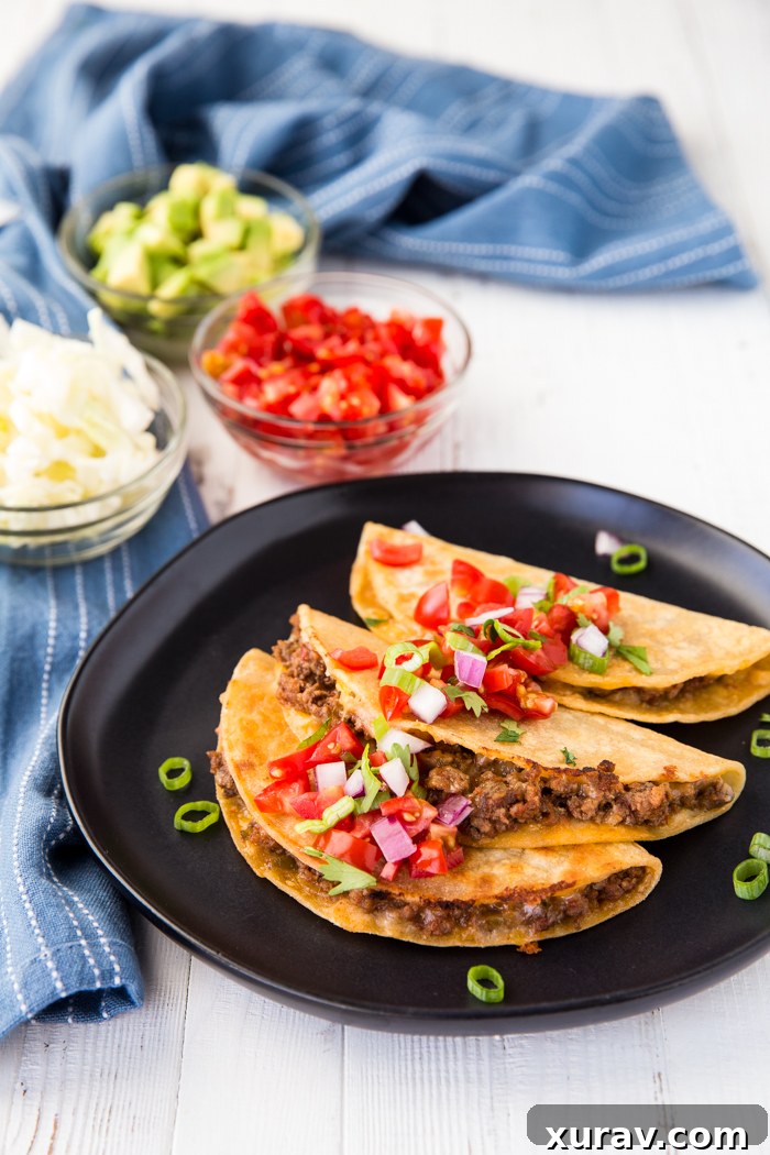 Delicious Griddle Beef Tacos served with fresh toppings