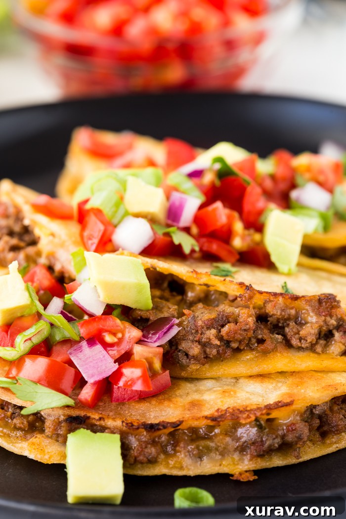 Assembling Griddle Beef Tacos on a hot griddle
